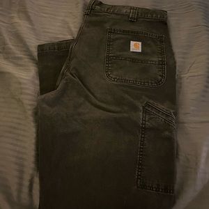 Carhartt work pants, green in color and in excellent condition.
